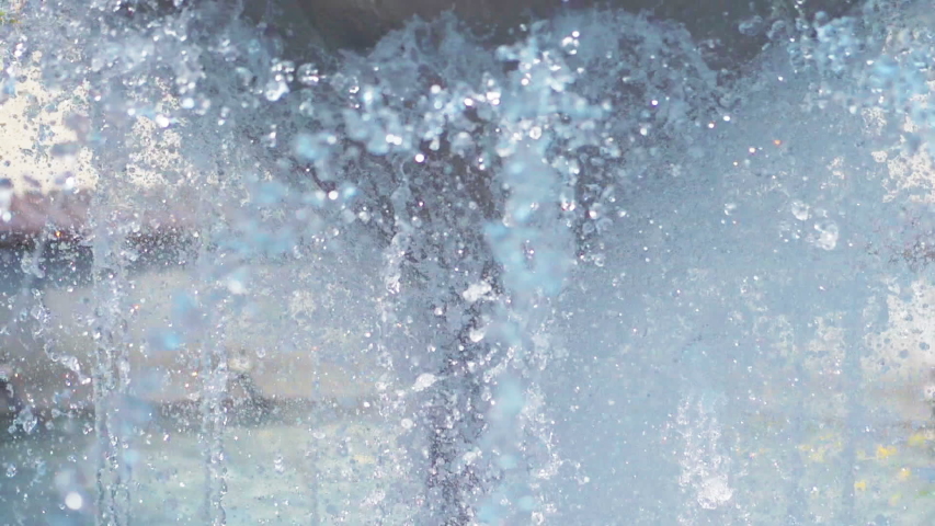 Splashing water drops in slow motion 180fps | Shutterstock HD Video #1055749715