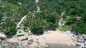 drone aerial reveal of koh tao thailand island coastline 