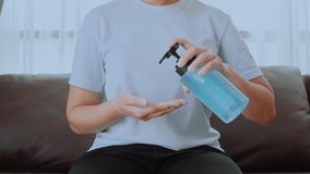 Woman hands using alcohol gel clean wash hand sanitizer anti virus bacteria Hygiene and Healthcare concept to Covid-19 virus prevention at Home - Powered by Shutterstock - Get 15% off with code: PIKWIZARD15