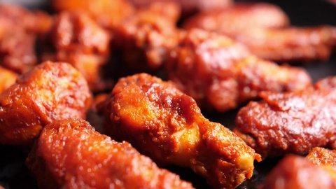 Closeup of spicy hot buffalo wings on a plate