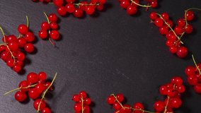 juicy red cranberry on a black stone table. High quality 4k footage