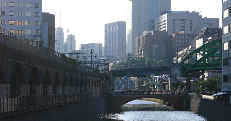 A riverside at Mansei bridge in Tokyo long shot. Chiyoda district Akihabara Tokyo Japan - 06.08.2020 : It is called Mansei bridge.