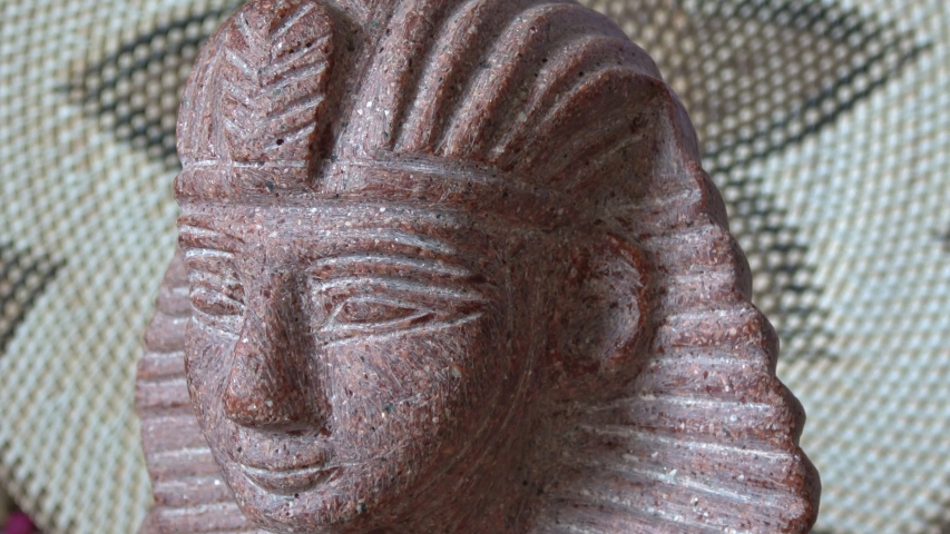 Statue and mask of the world