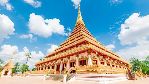 KHONKAEN / THAILAND - MAY 11 2019 : Time lapse sky and Mahathat Kaen Nakhon at Khon Kaen province, Thailand.
Temple Buddha golden Stupa 9 floor.