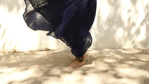 Indian classical dance move, feet rotation shot 
