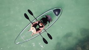 Young couple on the paddle boat on the beach in the city of Maceió Alagoas - Brazil - Powered by Shutterstock - Get 15% off with code: PIKWIZARD15