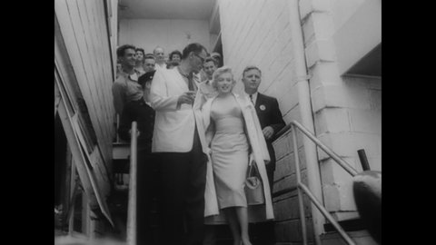 CIRCA 1950s - Marilyn Monroe is seen with her husband Arthur Miller, then at a nighttime movie premiere (narrated in 1962).
