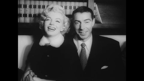 CIRCA 1954 - Marilyn Monroe and Joe DiMaggio kiss for photographers (narrated in 1962).
