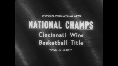 CIRCA 1962 - The Cincinnati Bearcats play the Ohio State Buckeyes in the NCAA championships, held in Louisville's Freedom Hall.