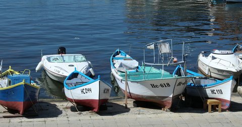 Nesebar, Bulgaria - August 9, 2019: Old Wooden Fishing Boats In The Port Of Nessebar (Nesebar) Old Town, Black Sea Coast In Bulgaria, Europe - DCi 4K Video