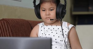 asian girl student learning online with laptop at home, education concept.