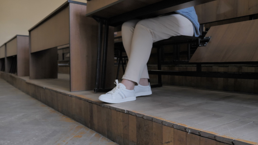 Foot under table