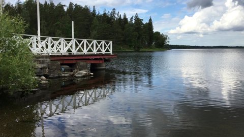 A wooden pier at lake called Malaren in Stockholm, Sweden. July, 2020.