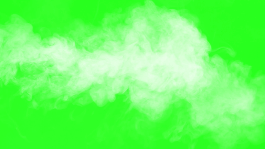 Portion White Smoke Floats Right. Remnants of white smoke slowly floating to the right clearing the alpha channel screen Royalty-Free Stock Footage #1055900651