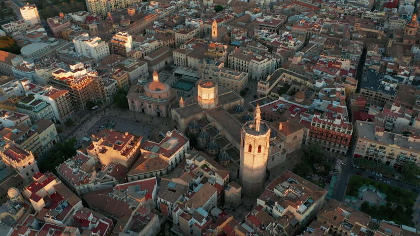 Aerial view. Valencia, Spain panning around the Miguelet Bell Tower and Cathedral. Royalty-Free Stock Footage #1055922275