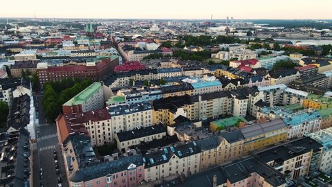 Aerial view of Helsinki during Sunset, Finland. Drone panning in circle in helsinki city.