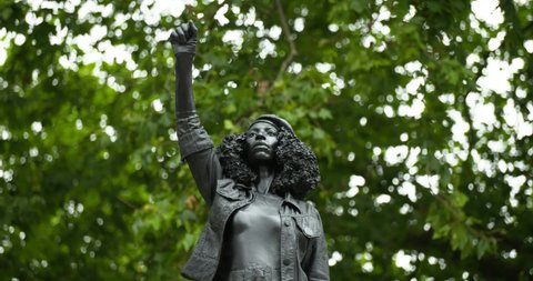 Bristol, Avon/UK-July 15th,2020: Figure of Black Lives Matter protester Jen Reid appears on the plinth occupied by the statue of slave trader Edward Colston
