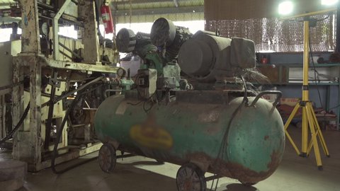 the movement footage of the old pistol air compressor in the  factory
