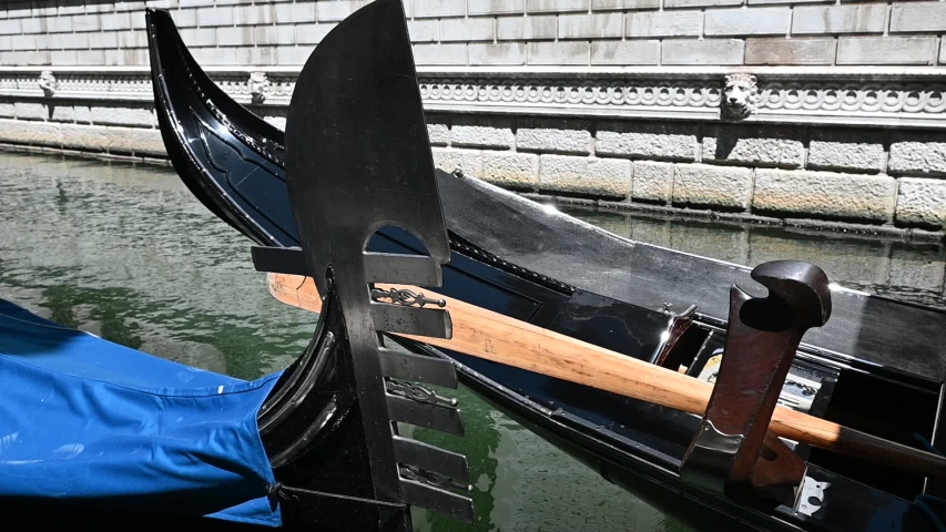 Venice, Italy - gondolas and gondoliers in the Grand Canal near the Rialto Bridge, in the San Marco Basin and between the canals of the lagoon city