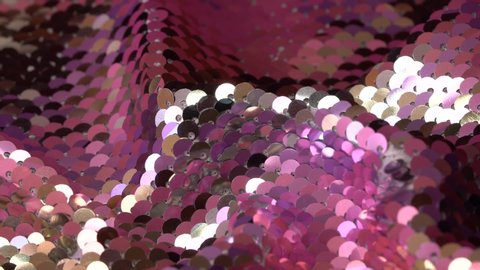 Shiny sequined fabric texture with pink and silver paillettes. Holiday background