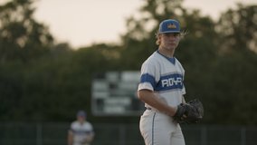 Strike! Baseball pitcher throwing a fastball pitch in a competitive game. Shot in slow-motion and in 4k.  - Powered by Shutterstock - Get 15% off with code: PIKWIZARD15