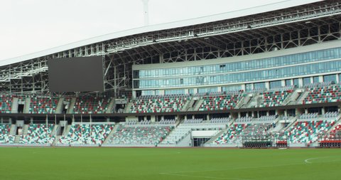 WIDE View of empty stadium seats before game or during Coronavirus COVID-19 pandemic. Shot on RED cinema camera with Anamorphic lens
