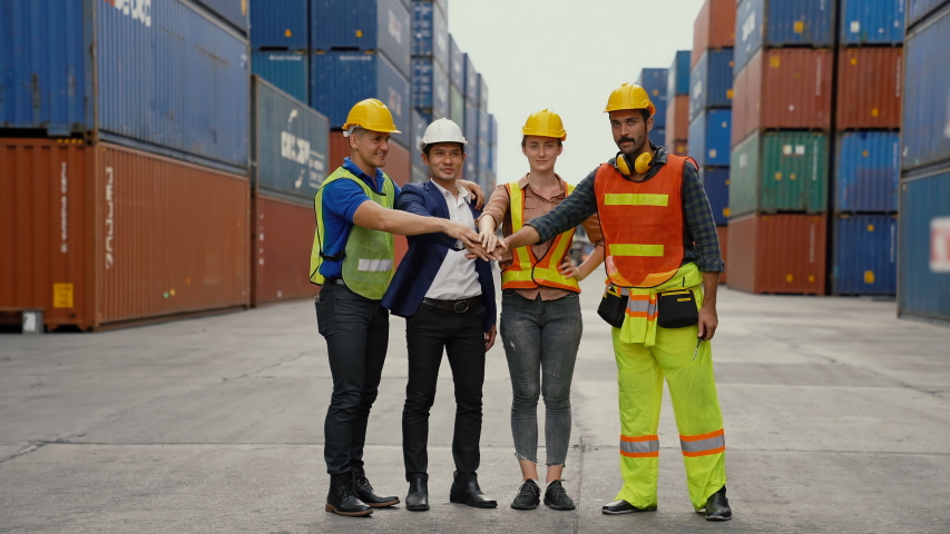 success and winning concept - happy teamwork and determination to succeed import and export support logistics Container , transportation concept. Royalty-Free Stock Footage #1056009389