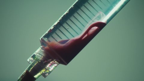 concept - syringe close up
taking blood sample- cinematographic taking