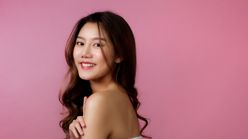 Beautiful Young Asian Woman long hair  with Clean Fresh Skin. Face care, Facial treatment, Cosmetology, beauty and healthy skin and cosmetic ideas concept. woman beauty skin isolated  