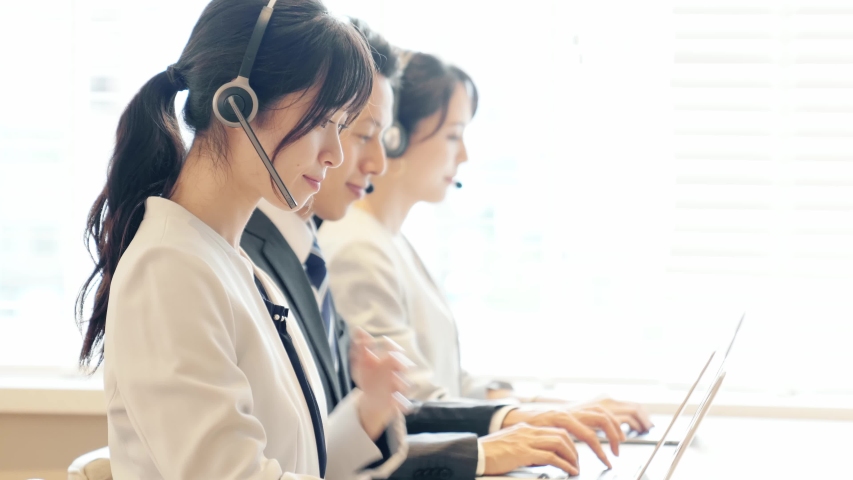 Group of asian operator. Call center. Customer support. Royalty-Free Stock Footage #1056025247