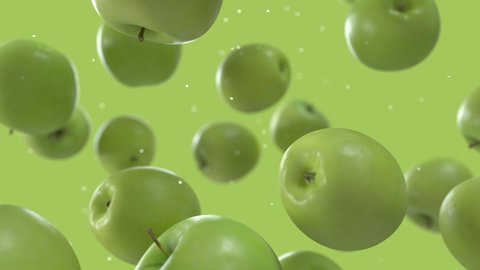 Green Apples Falling Down with Water Drops in Super Slow Motion on Solid Green Background. Endless Seamless Loop 3D Animation: stockvideo