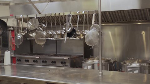 Interior of the kitchen of the restaurant / canteen in the school with dishes waiting for the arrival of the chefs.