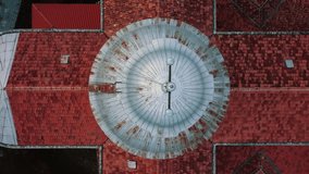 Catholic Church With Red Roof in European country. Aerial View, Vertical Video