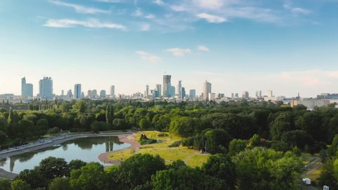 Pole Mokotowskie Warsaw Park field with lake and city aerial view