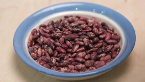 Dried Red beans in a plate. 4k video shot.