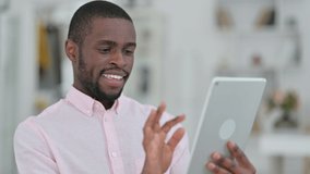 Portrait of African Man Talking on Video Call on Tablet 