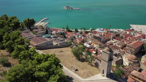 Aerial drone fly through video of historic and picturesque seaside old town of Nafplio, Argolida, Peloponnese, Greece