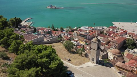 Aerial drone rotational video of historic and picturesque old town of Nafplio as seen from Acronafplia castle, Argolida, Peloponnese, Greece