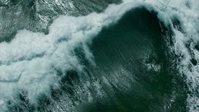 Vitality of blue energy and clear ocean water. Powerful stormy sea waves in top-down drone shot perspective.  Crashing wave line in Open Atlantic sea with foamy white texture. - Powered by Shutterstock - Get 15% off with code: PIKWIZARD15