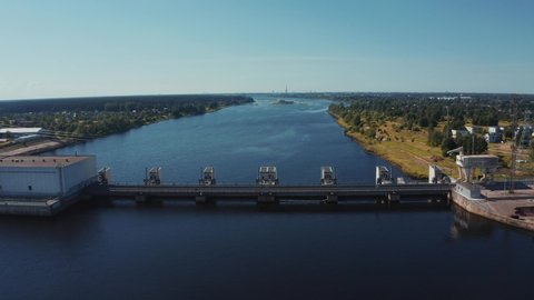 Aerial view of the huge dam in Latvia near city of Salaspils and Riga. A huge reservoir of water and river Daugava.