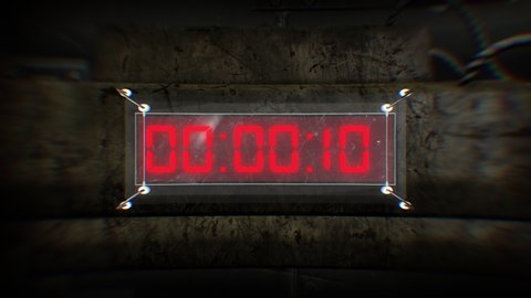 A digital countdown timer on a bomb or explosive device counting down from ten seconds to zero