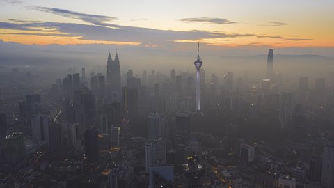 Time lapse: Kuala Lumpur city view during dawn overlooking the city skyline. Prores UHD