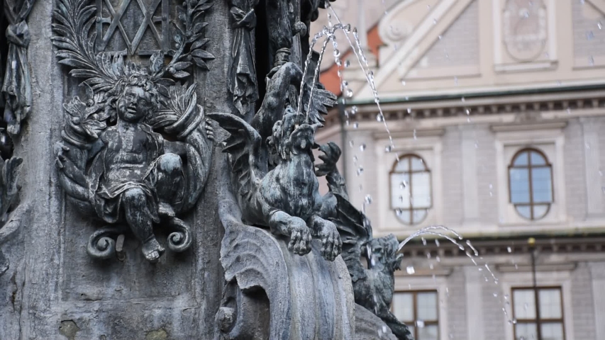 Octagonal yard called Fountain Courtyard (Brunnenhof) is one of the ten courtyards of the Residenz Palace. The bronze Wittelsbach Fountain in the middle was erected in 1610 Royalty-Free Stock Footage #1056125186