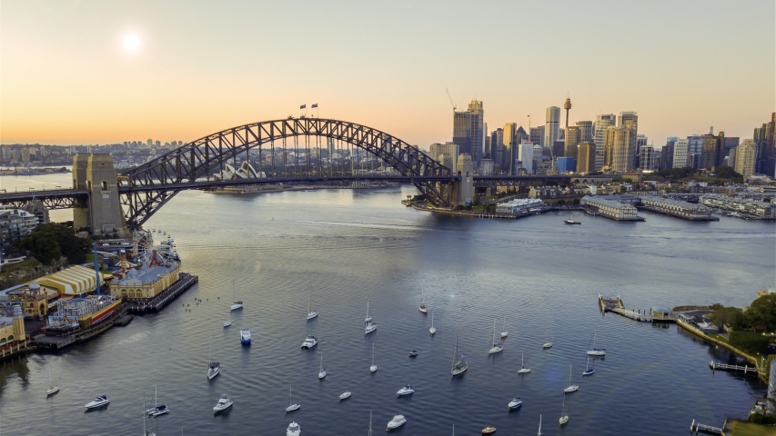Hyperlapse drone lapse of Sydney city skyline during sunrise.  Royalty-Free Stock Footage #1056125870