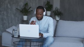 Online learning, African american student, distance lesson, education at home, webinar conference. Male African American Coach conducts online training.