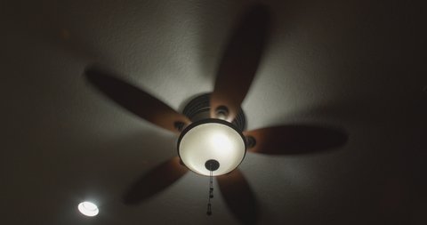 This is a video of a ceiling fan spinning with the light on. Shot on a GH5