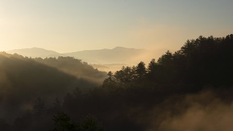 A stunning timelapse of fog passing over the Blue Ridge Mountains during sunrise.