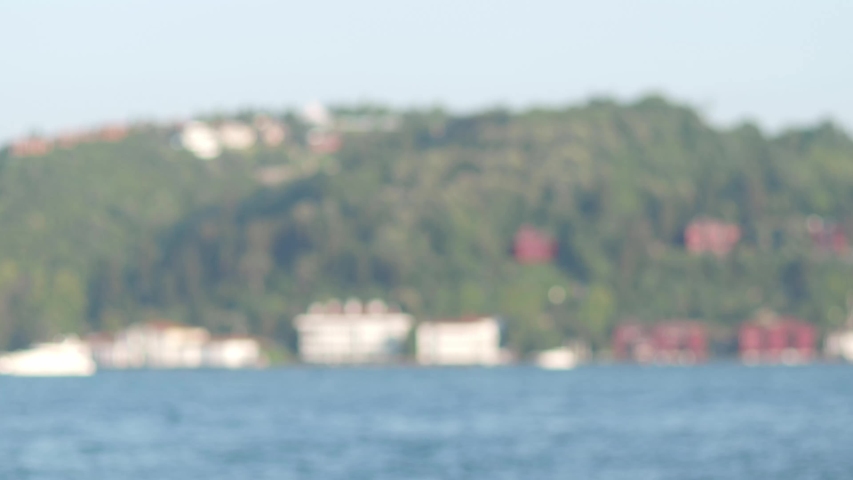 Woman wrapped in the flag of the Republic of Turkey.
