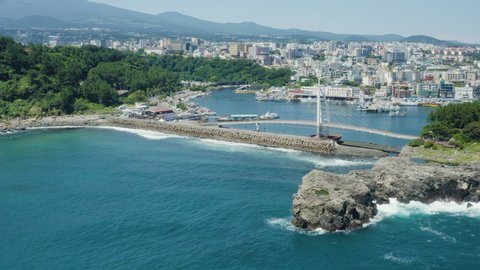 The scenery of Jeju Island, the representative resort city of Korea. Seogwipo City and Seyeon Bridge.