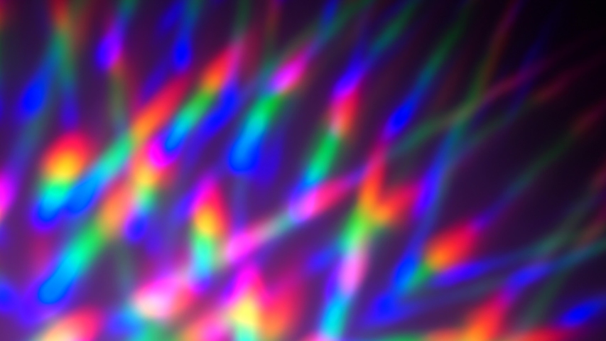 The neon lights crystal prism rainbow gradient. Holographic iridescent abstract background. Blue purple pink color. Psychedelic movement | Shutterstock HD Video #1056145511